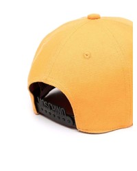 Berretto da baseball stampato arancione di Moschino
