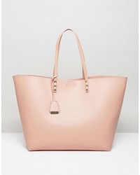 Borsa shopping con borchie rosa