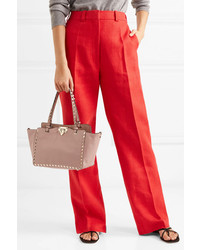 Borsa shopping in pelle con borchie rosa di Valentino