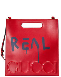 Borsa shopping in pelle stampata rossa di Gucci