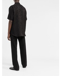 Camicia a maniche corte di seta a fiori nera di Saint Laurent