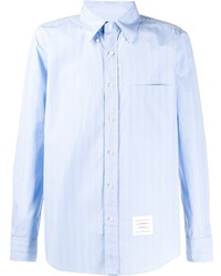 Camicia a maniche lunghe a righe verticali azzurra di Thom Browne