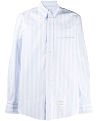 Camicia a maniche lunghe a righe verticali azzurra di Thom Browne