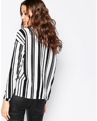 Camicia elegante a righe verticali bianca e nera