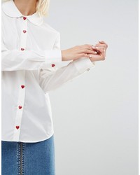 Camicia elegante di seta bianca di Love Moschino