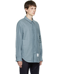 Camicia giacca di lana azzurra di Thom Browne