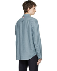 Camicia giacca di lana azzurra di Thom Browne