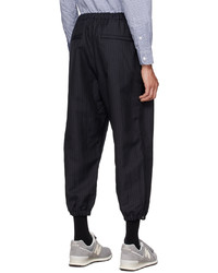 Chino a righe verticali neri di Comme des Garcons Homme