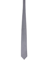 Cravatta di seta con motivo pied de poule bianca e blu scuro