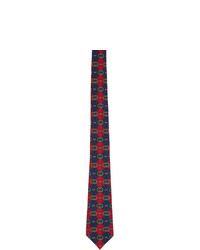 Cravatta stampata rossa e blu scuro di Gucci