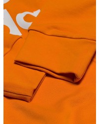 Felpa con cappuccio stampata arancione di adidas