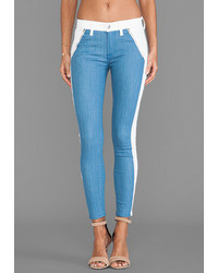 Jeans aderenti a righe verticali bianchi e blu