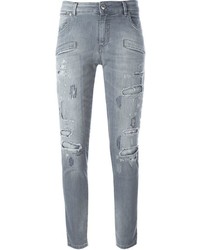 Jeans aderenti di cotone strappati grigi di PIERRE BALMAIN
