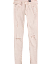 Jeans aderenti di cotone strappati rosa