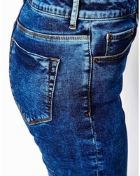 Jeans aderenti lavaggio acido blu scuro di Asos