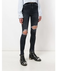 Jeans aderenti leopardati neri di Marcelo Burlon County of Milan