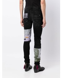 Jeans aderenti patchwork neri di Amiri