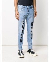 Jeans aderenti stampati azzurri di DSQUARED2