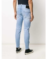 Jeans aderenti stampati azzurri di DSQUARED2