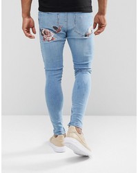Jeans aderenti stampati azzurri di Siksilk