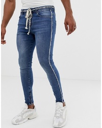 Jeans aderenti stampati blu di The Couture Club