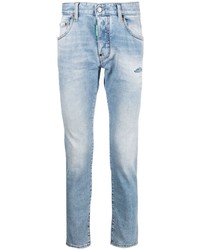 Jeans aderenti strappati azzurri di DSQUARED2