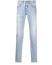 Jeans aderenti strappati azzurri di Eleventy