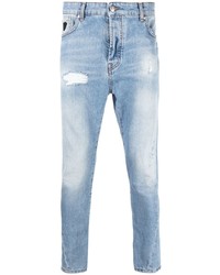 Jeans aderenti strappati azzurri di John Richmond