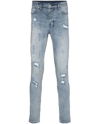 Jeans aderenti strappati azzurri di Ksubi