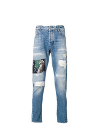 Jeans aderenti strappati azzurri di Marcelo Burlon County of Milan