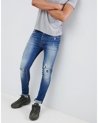 Jeans aderenti strappati azzurri di Mennace