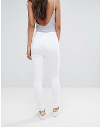 Jeans aderenti strappati bianchi