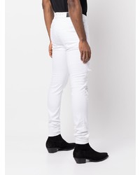 Jeans aderenti strappati bianchi di Amiri
