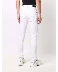 Jeans aderenti strappati bianchi di Amiri
