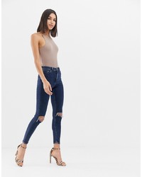 Jeans aderenti strappati blu scuro di ASOS DESIGN