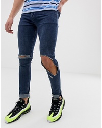 Jeans aderenti strappati blu scuro di ASOS DESIGN