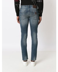Jeans aderenti strappati blu scuro di Armani Exchange