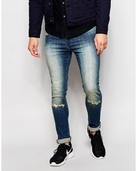 Jeans aderenti strappati blu di Asos