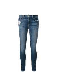 Jeans aderenti strappati blu di Frame Denim