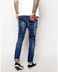 Jeans aderenti strappati blu di Asos