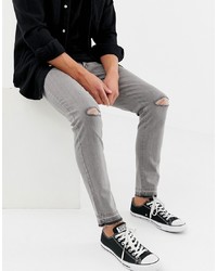 Jeans aderenti strappati grigi di D-struct