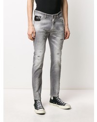 Jeans aderenti strappati grigi di John Richmond
