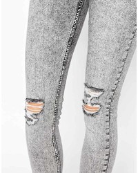 Jeans aderenti strappati grigi di Cheap Monday