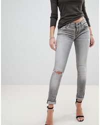 Jeans aderenti strappati grigi di Replay