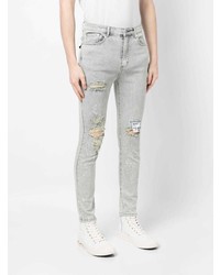 Jeans aderenti strappati grigi di Musium Div.