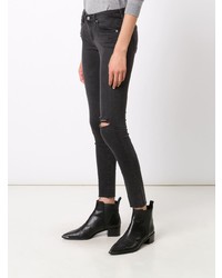 Jeans aderenti strappati grigio scuro di AG Jeans