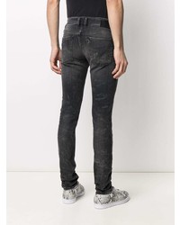 Jeans aderenti strappati grigio scuro di Diesel