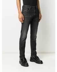 Jeans aderenti strappati grigio scuro di Diesel