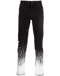 Jeans aderenti strappati neri e bianchi di Dolce & Gabbana