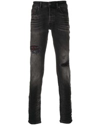 Jeans aderenti strappati neri di Diesel